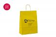 trkiga kollased paberkotid | Fotogalerii- kollased paberkotid, millele trkitud klientide logod k