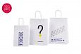 Fotogalerii- valged paberkotid, millele trkitud klientide logod Valged trkiga paberkotid on suur