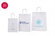 Valged paberist kotid on s.. | Fotogalerii- valged paberkotid, millele trkitud klientide logod So