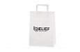 Stylish white paper bag with flat handles in strong quality... | Bildgalleri - Vita papperskassar 