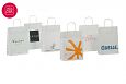 Valged paberist kotid on s.. | Fotogalerii- valged paberkotid, millele trkitud klientide logod va